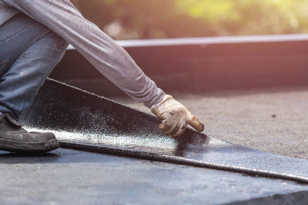 Professional Basement Waterproofing technician working in Camp Barrett, VA